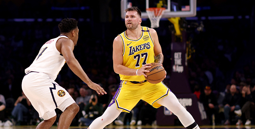Luka Doncic #77 of the Los Angeles Lakers steps back to shoot against Jalen Pickett #24 of the Denver Nuggets during the third quarter at Crypto.com Arena on Thursday in Los Angeles, California (AFP photo)