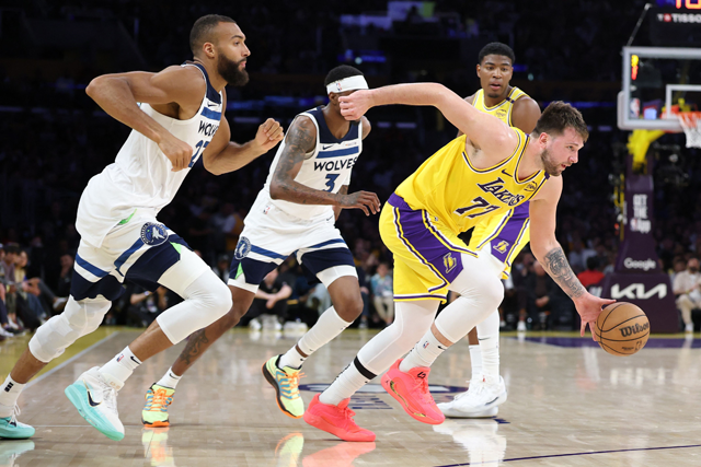 Luka Doncic #77 of the Los Angeles Lakers dribbles the ball in the second quarter against the Minnesota Timberwolves in Game Two of the Western Conference First Round NBA Playoffs at Crypto.com Arena on Wednesday in Los Angeles, California (AFP photo)