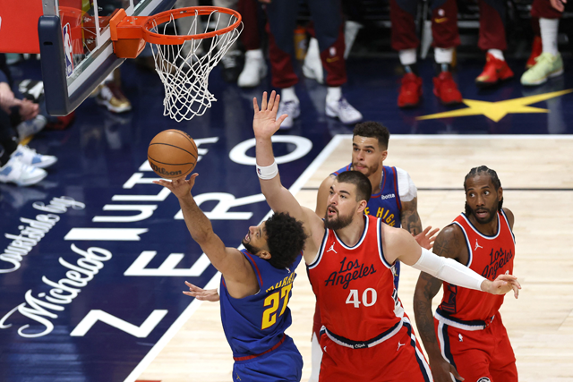 Jamal Murray #27 of the Denver Nuggets drives to the basket against Ivica Zubac #40 of the LA Clippers during the third quarter in Game Seven of the Western Conference First Round NBA Playoffs at Ball Arena on Sunday in Denver, Colorado (AFP photo)