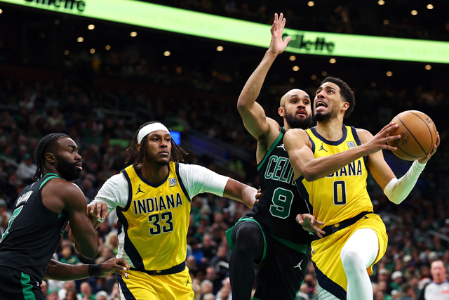 Tyrese Haliburton #0 of the Indiana Pacers takes a shot against Derrick White #9 of the Boston Celtics during the second half at TD Garden on Saturday in Boston, Massachusetts (AFP photo)