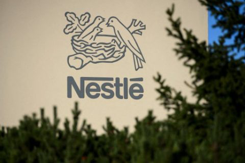 A logo of the world’s leading food industry group Nestle is seen on October 9, 2014, at the group’s Research Centre in Vers-chez-les-Blanc above Lausanne (AFP file photo)