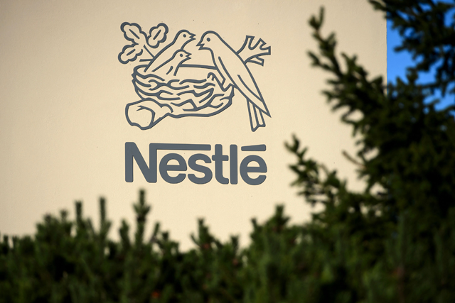 A logo of the world's leading food industry group Nestle is seen on October 9, 2014, at the group's Research Centre in Vers-chez-les-Blanc above Lausanne  (AFP photo)