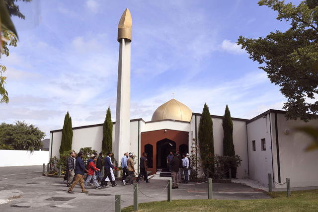 Members of the local Muslim community enter Al Noor Mosque after it has been reopened in Christchurch on Saturday  (AFP photo)