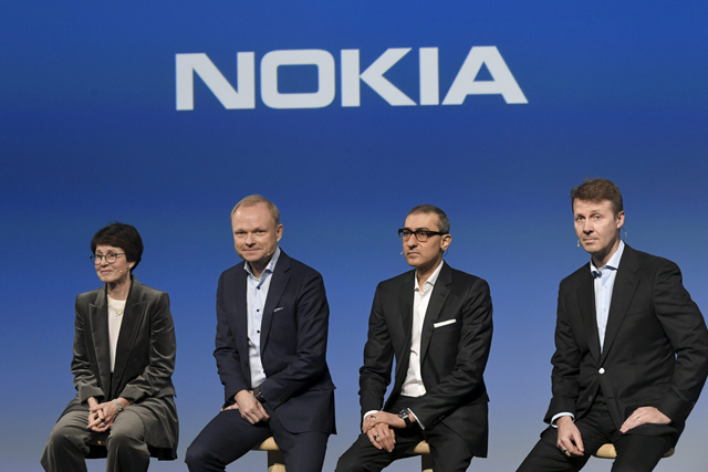 From left to right: Nokia Vice Chairman Sari Baldauf, new president and CEO Pekka Lundmark, resigning President CEO Rajeev Suri and Chairman of the Board Risto Siilasmaa and Nokia Chairman of the Board Risto Siilasmaa attend a press conference at the Nokia headquarters in Espoo, Finland, on Monday  (AFP photo)