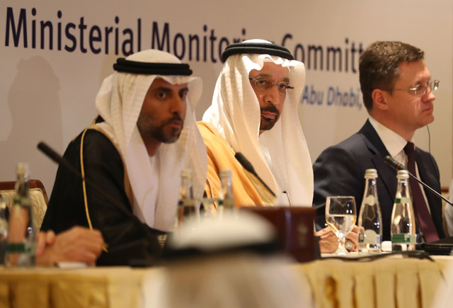Saudi Arabia’s Energy Minister Khalid Al Falih (centre), Russian Energy Minister Alexander Novak (right) and UAE's Energy Minister Suhail Mohammed Faraj Al Mazroui attend during a meeting of their Joint Ministerial Monitoring Committee in the Emirati capital Abu Dhabi, on Sunday   (AFP photo)