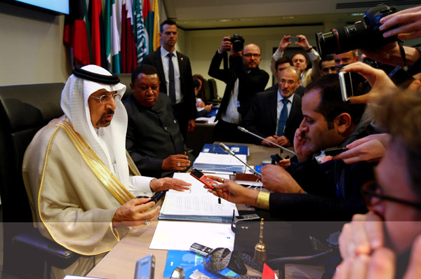 OPEC president, Saudi Arabia’s Energy Minister Khalid Al Falih, and OPEC Secretary General Mohammad Barkindo talk to journalists before a meeting of the Organisation of the Petroleum Exporting Countries in Vienna, Austria, on Thursday (Reuters photo)