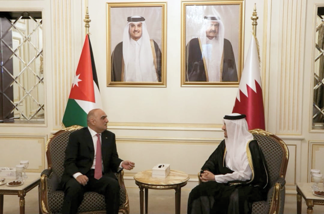 Prime Minister Bisher Khasawneh meets with Qatari Prime Minister and Foreign Minister Sheikh Mohammed Bin Abdulrahman Bin Jassim Al Thani, in Doha, on Monday (Petra Photo)