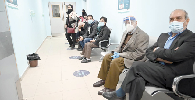 People are seen waiting to take the COVID vaccine at a vaccination centre in Amman in this photo taken on January 13, 2021 (JT file photo)