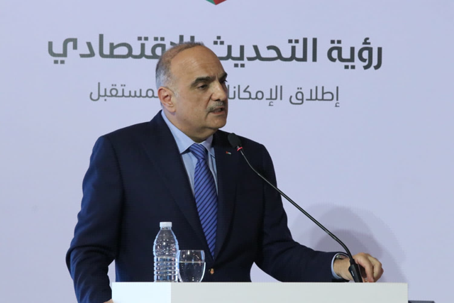 Prime Minister Bisher Khasawneh speaks during the inauguration of the interactive meeting to present progress on the Economic Modernisation Vision 2023-2025 executive plan on Saturday (Petra photo)