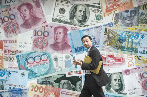 In this photo taken on November 9, 2016, a man walks past a display showing bank notes of different currencies in Hong Kong (AFP file  photo)