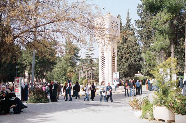 Students walk in front of the University of Jordan’s bell tower in this undated photo. Jordanian PhD holders say employment seems increasingly hard to find and they charge that many universities do not adhere to hiring regulations (JT file photo)