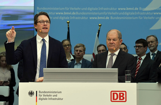 German Transport Minister Andreas Scheuer (left) and German Finance Minister and Vice Chancellor Olaf Scholz address the media at the signing of an agreement on railway modernisations with German railway operator Deutsche Bahn in Berlin, Germany, on Tuesday (AFP photo)