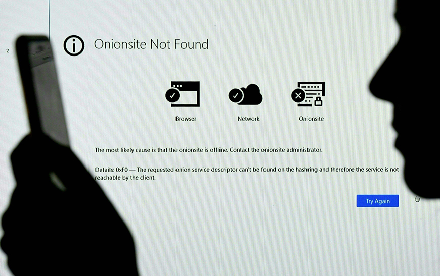 This file photo illustration taken in Arlington, Virginia, on May 14, shows a screen displaying the Darkside Onionsite address with a notice saying it could not be found, as company servers were taken down by unknown actors a week after the cyber extortionist forced the shutdown of a large US oil pipeline in a ransomware scam (AFP photo)
