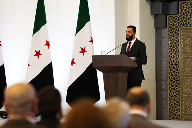 This handout picture released by the official Syrian Arab News Agency shows Syria's interim president Ahmed al-Sharaa addressing representatives and dignitaries of Syrian communities during the National Dialogue Conference called for by the country's new authorities in Damascus today (AFP photo)