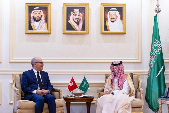 This handout photo provided by the Saudi Press Agency SPA on Thursday, shows Saudi Minister of Foreign Affairs Faisal Bin Farhan meeting with his Tunisian counterpart Nabil Ammatr in Riyadh (AFP photo)