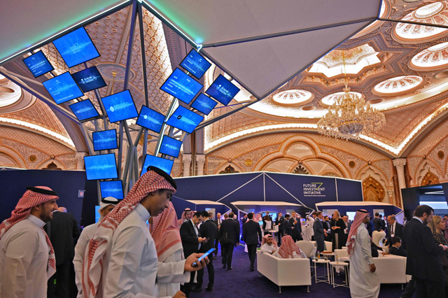 Saudi and foreign journalists are pictured at the Future Investment Initiative forum at the King Abdulazziz Conference Centre in Saudi Arabia's capital, Riyadh, on Tuesday (AFP photo)