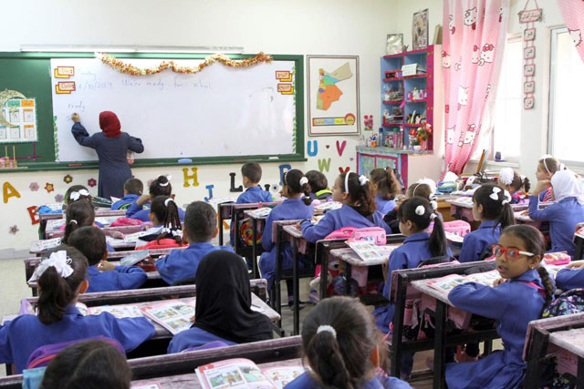 Around 1.5 million students returned to nearly 4,000 public schools on Sunday after the end of the month-long teacher’s strike (Photo by Osama Aqarbeh)