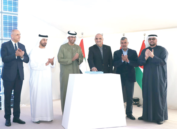 Prime Minister Bisher Khasawneh launches the Baynouna solar and photovoltaic energy station, located near the Muwaqar region east of Amman, during a ceremony attended by UAE Minister of Industry and Advanced Technology Sultan Ahmed Al Jaber, and senior officials on Saturday (Petra photo)