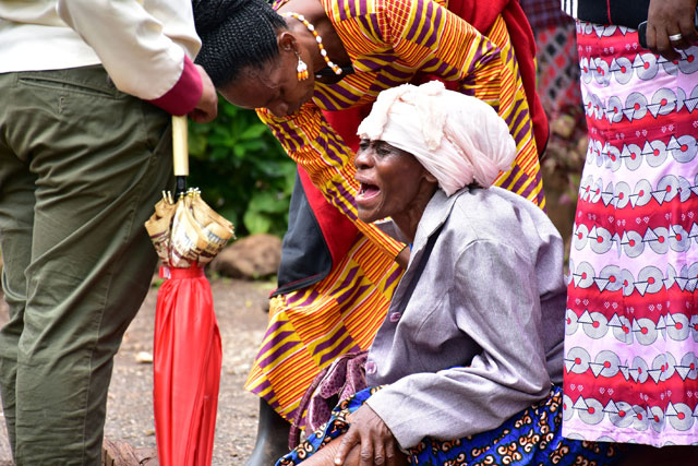 Moshi residents in Kilimanjaro region, north Tanzania, grieve at Mawenzi hospital, on Sunday, after the death of her granddaughter who was killed in stampede yesterday at Majengo open ground during the church service  (AFP photo)