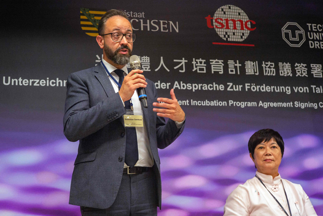 Sebastian Gemkow, minister of Germany’s Saxon State Ministry of Science speaks next to Lora Ho, senior vice president of human resources of Taiwan Semiconductor Manufacturing Company (TSMC), during a semiconductor talent incubation programme agreement signing ceremony in Taichung on Tuesday (AFP photo)