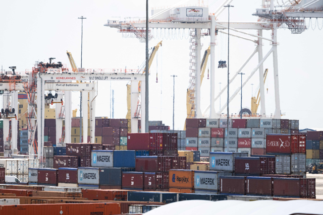 Cargo shipping containers and cranes are seen at cargo terminals as part of the Port of Baltimore in Baltimore, Maryland, June 12, 2024, following the reopening of the shipping channel in the Baltimore Harbor after the Francis Scott Key Bridge collapsed (AFP photo)