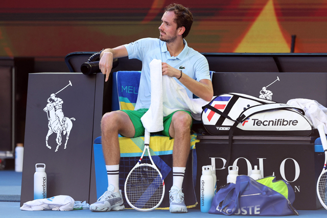 Russia's Daniil Medvedev gestures while taking a break between games during his men's singles match against Thailand's Kasidit Samrej on day three of the Australian Open tennis tournament in Melbourne on Tuesday (AFP photo)