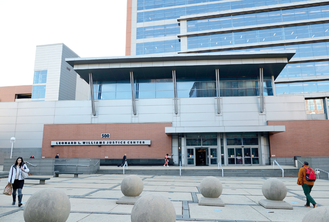People walk past the Leonard L. Williams Justice Centre on Monday in Wilmington, Delaware (AFP photo)