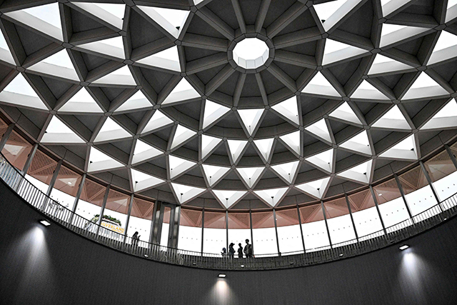 People are seen under the lotus-shaped skylight at Ben Thanh metro station in Ho Chi Minh City on Sunday  (AFP photo)