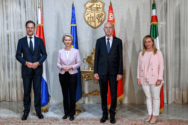 This handout photo provided by the Tunisian Presidency Press Service shows Tunisia's President Kais Saied posing for a photo with the President of the European Commission Ursula von der Leyen, Italian Prime Minister Giorgia Meloni, and Dutch Prime Minister Mark Rutte at Carthage Palace in Carthage on the eastern outskirts of the Tunisian capital on Sunday (AFP photo/Ho/Presidency Press Service)