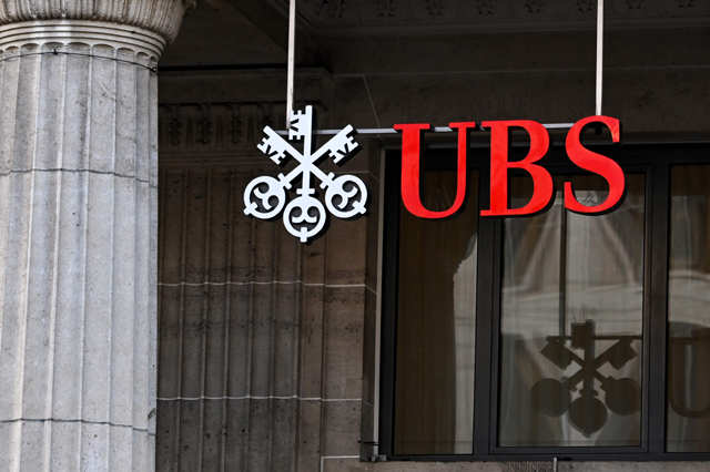 A sign and logo of the Swiss giant banking UBS is seen in Lausanne on February 6 (AFP  photo)