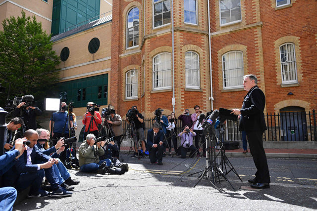 Thames Valley Police's Chief Constable John Campbell gives a statement to the media at a police cordon at the Abbey Gateway near Forbury Gardens Park in Reading, west of London, on Sunday, following a fatal stabbing incident the previous day  (AFP photo)