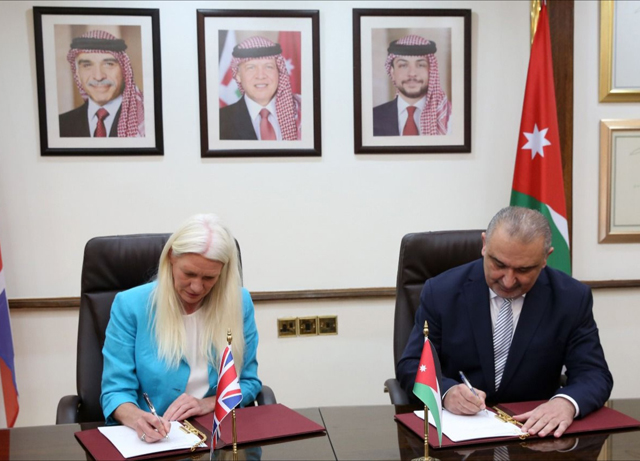 Minister of Planning and International Cooperation Nasser Shraideh and UK Minister for Asia and the Middle East at the Foreign, Commonwealth and Development Office Amanda Milling sign a grant agreement on Sunday (Photo courtesy of Planning Ministry)