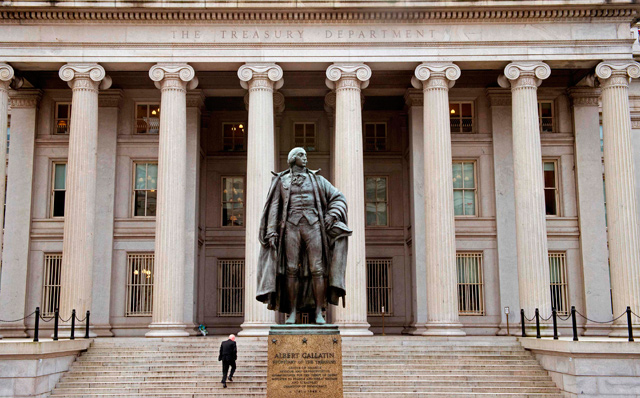 In this photo, taken on January 24, 2017, a man enters the US Treasury Department building on Pennsylvania Avenue in Washington, DC (AFP file photo)
