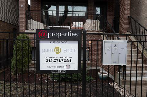 A home is offered for sale on Friday in Chicago, Illinois. Existing home sales in the United States rose 9.5% in February, marking the first time in more than two years that sales increased for two consecutive months (AFP photo)