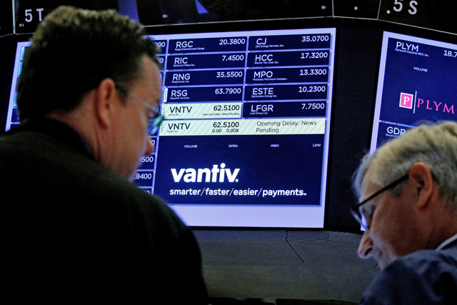 Traders wait for news at the post where US credit card technology firm Vantiv Inc. is traded on the floor of the New York Stock Exchange in New York, US, on July 5 (Reuters file photo)