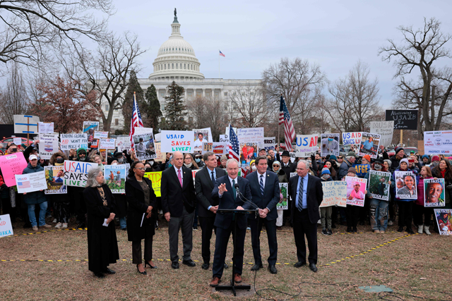 Current and former employees of the U.S. Agency for International Development (USAID) and their supporters rally with members of Congress outside the US Capitol on Wednesday in Washington, DC  (AFP photo)