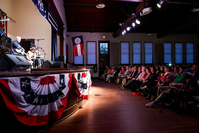 People attend a concert organized by The Friends of Jimmy Carter in celebration of former US President Jimmy Carter's 100th birthday, in Plains, Georgia, on Tuesday (AFP photo)