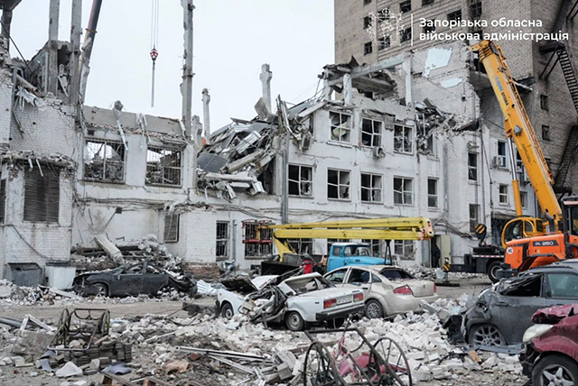 This handout photograph published on Wednesday shows a damaged building after a strike in the city of Zaporizhzhia, amid the Russian invasion of Ukraine (AFP photo)