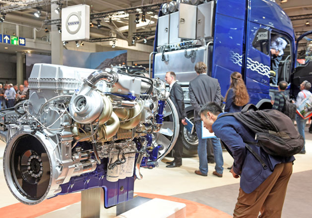 A visitor looks at a Volvo D16 engine at the booth of Swedish truck maker Volvo at the IAA truck show in Hanover, on September 22, 2016 (Reuters file photo)