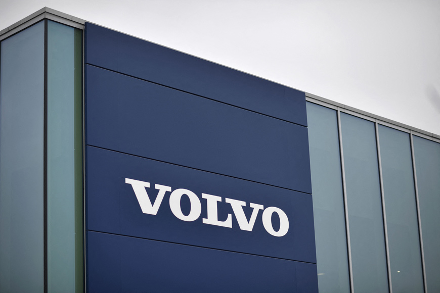 In this file photo taken on March 2, 2021, Volvo signage is seen at a Volvo dealership in Reading, west of London (AFP photo)