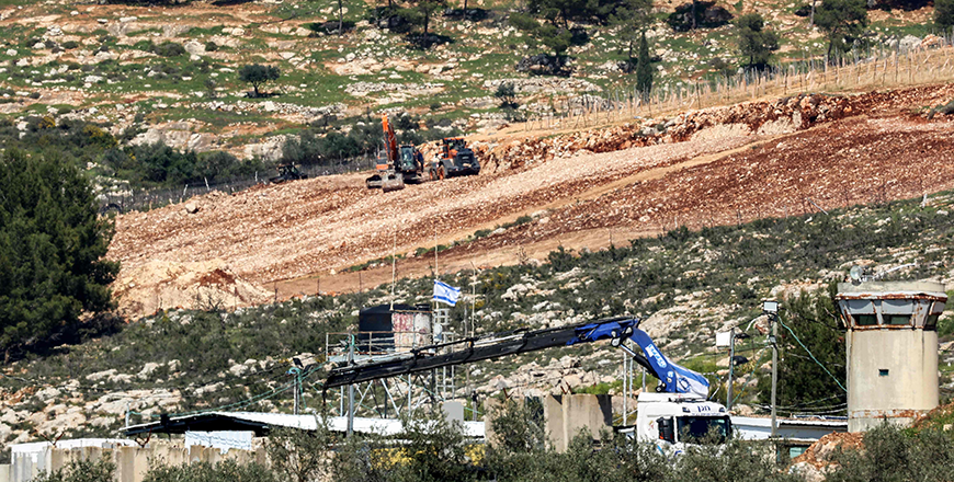 This picture taken from the village of Deir al-Hatab in the occupied West Bank yesterday  , 2025 shows Israeli excavators clearing ground for new expansions in the settlement of Elon Moreh (AFP photo)