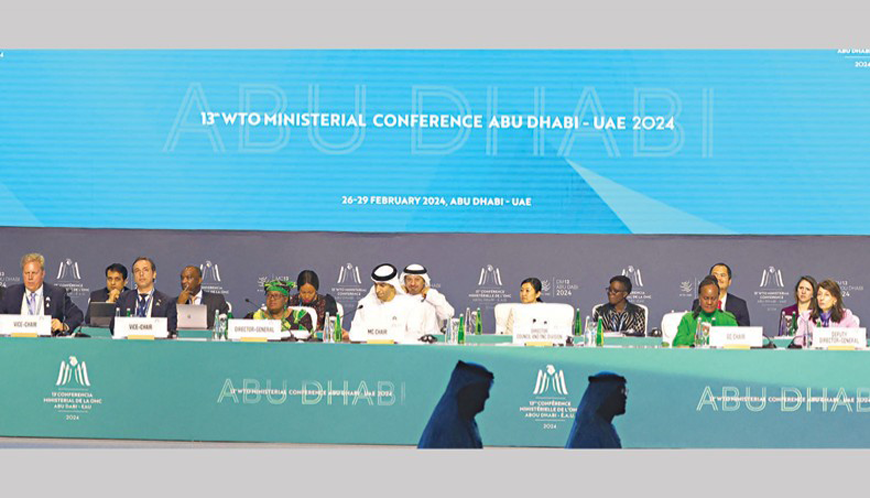 Delegates attend the 13th World Trade Organisation Ministerial Conference in Abu Dhabi on Monday (AFP file photo)