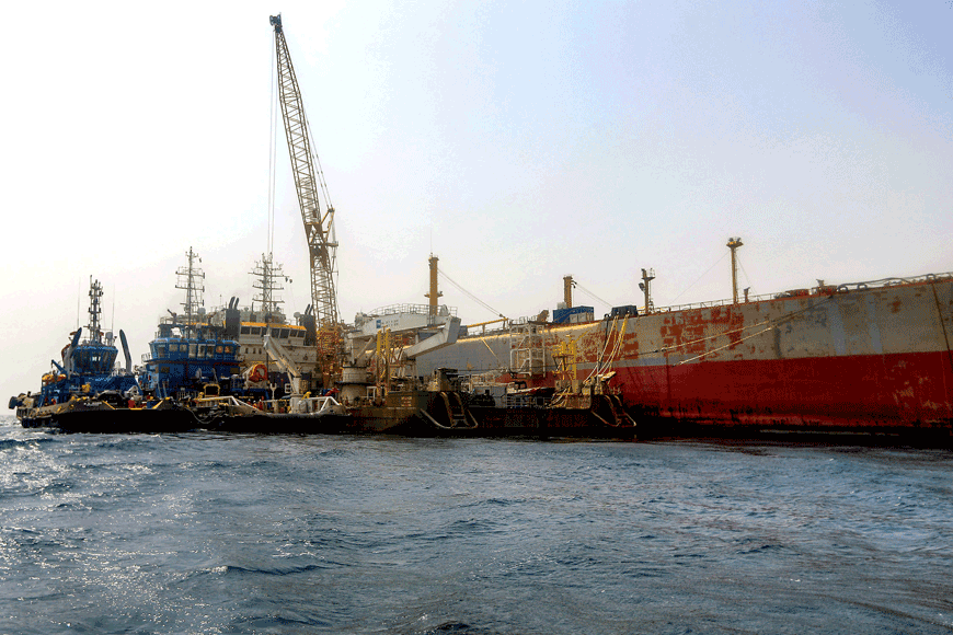 The beleaguered Yemen-flagged FSO Safer oil tanker is pictured in the Red Sea off the coast of Yemen's contested western province of Hodeida on Monday, during operations to remove more than a million barrels of oil from the vessel (AFP photo)