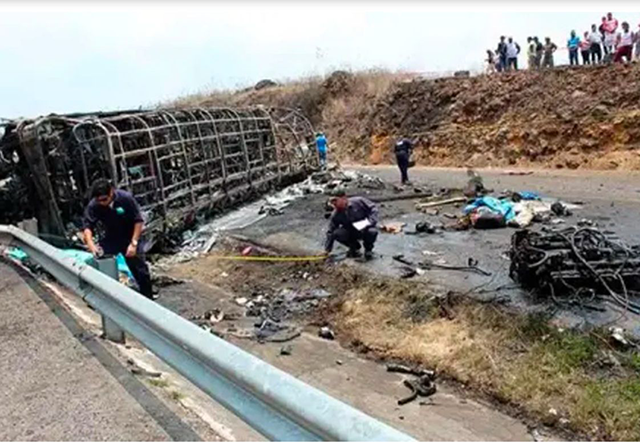 At least 21 people were killed in a multi-vehicle crash involving a trailer truck and a bus in the central Mexican state of Puebla on Wednesday, authorities said (AFP photo)