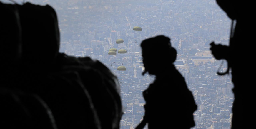 The Jordanian Armed Forces – Arab Army, in cooperation with several other countries, carries out seven airdrops of relief aid to the North of the war-ravaged Gaza Strip on Tuesday (JAF photo)