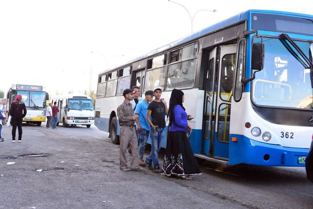 Students board a bus near the University of Jordan in Amman in this undated photo. Sweileh line bus drivers announced they were on strike on Sunday morning and refused to carry passengers (JT file photo)