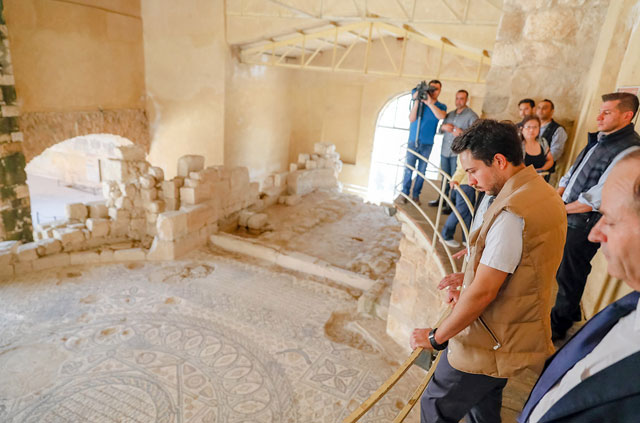 HRH Crown Prince Hussein stops by Hippolytus Hall during a visit to the Madaba Institute for Mosaic Art and Restoration on Monday (Petra photo)