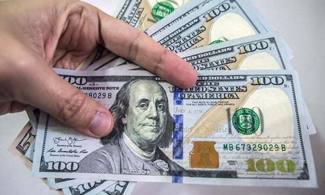 Commentators believe Washington will not allow the greenback to lose its status  (AFP photo)