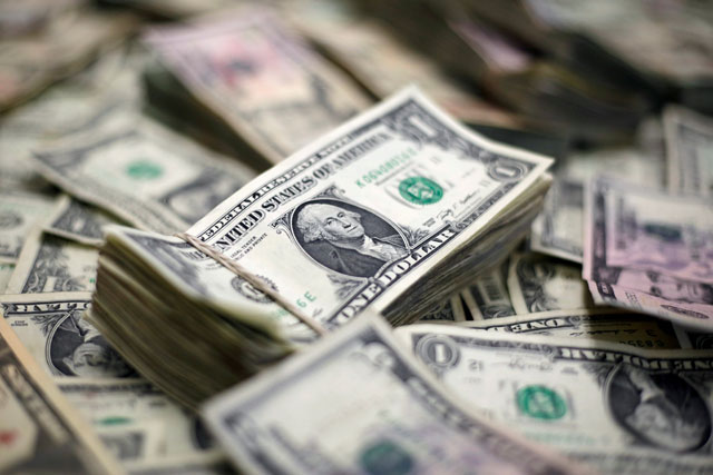 US dollar banknotes are seen in this photo illustration taken on February 12  (Reuters file photo)