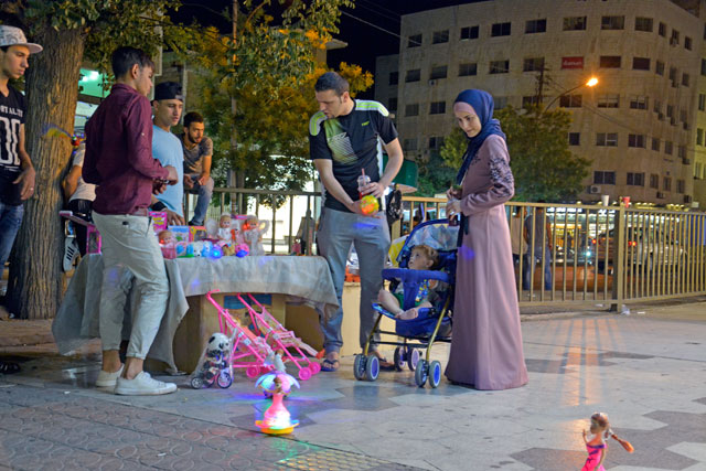   To protect local shops, the Cabinet has imposed fees on clothes, shoes, foodstuffs and children's toys (Photo by Amjad Ghsoun)